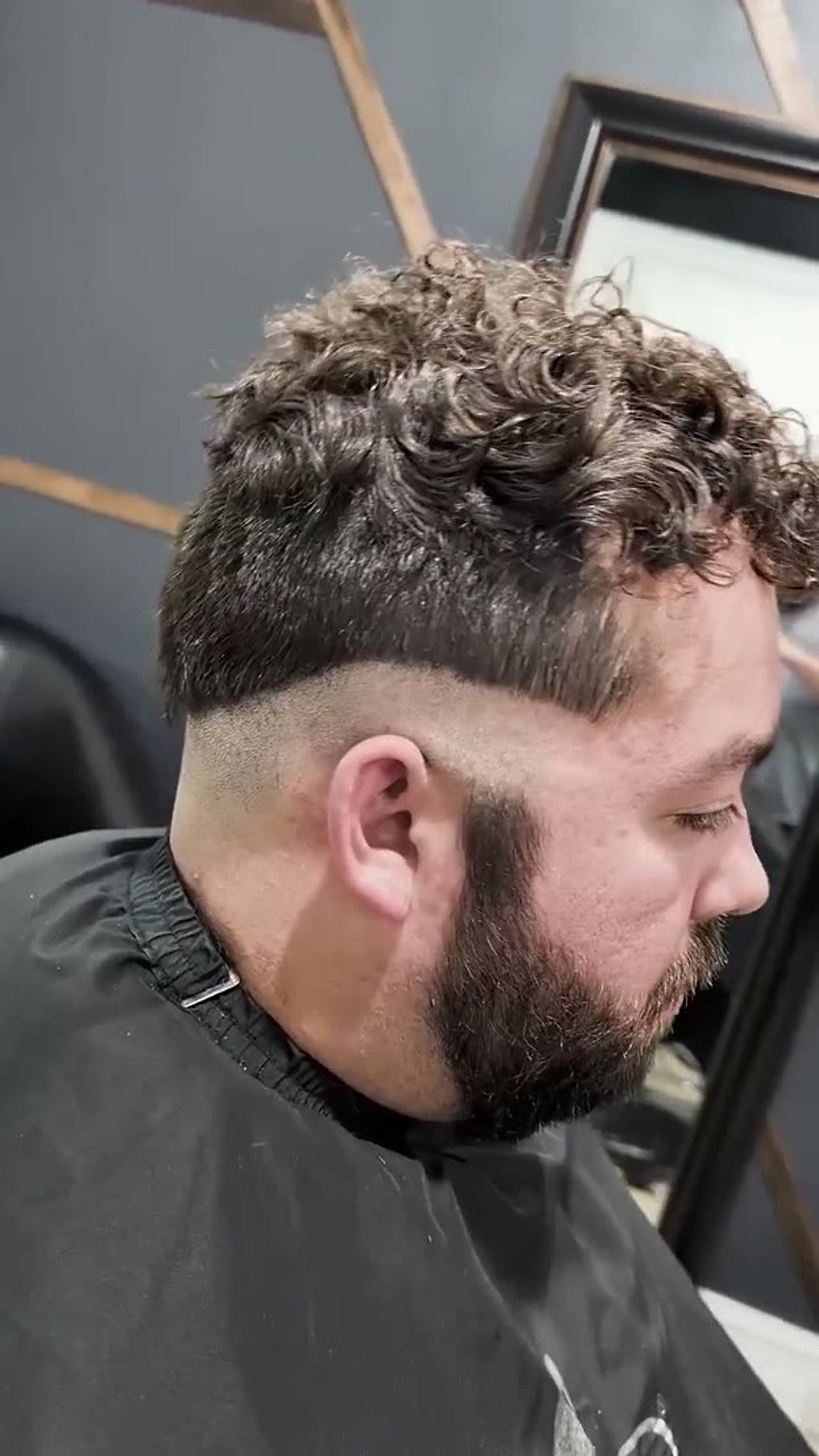 Curly fade haircut by Drew Styles barber in Cape Coral, FL